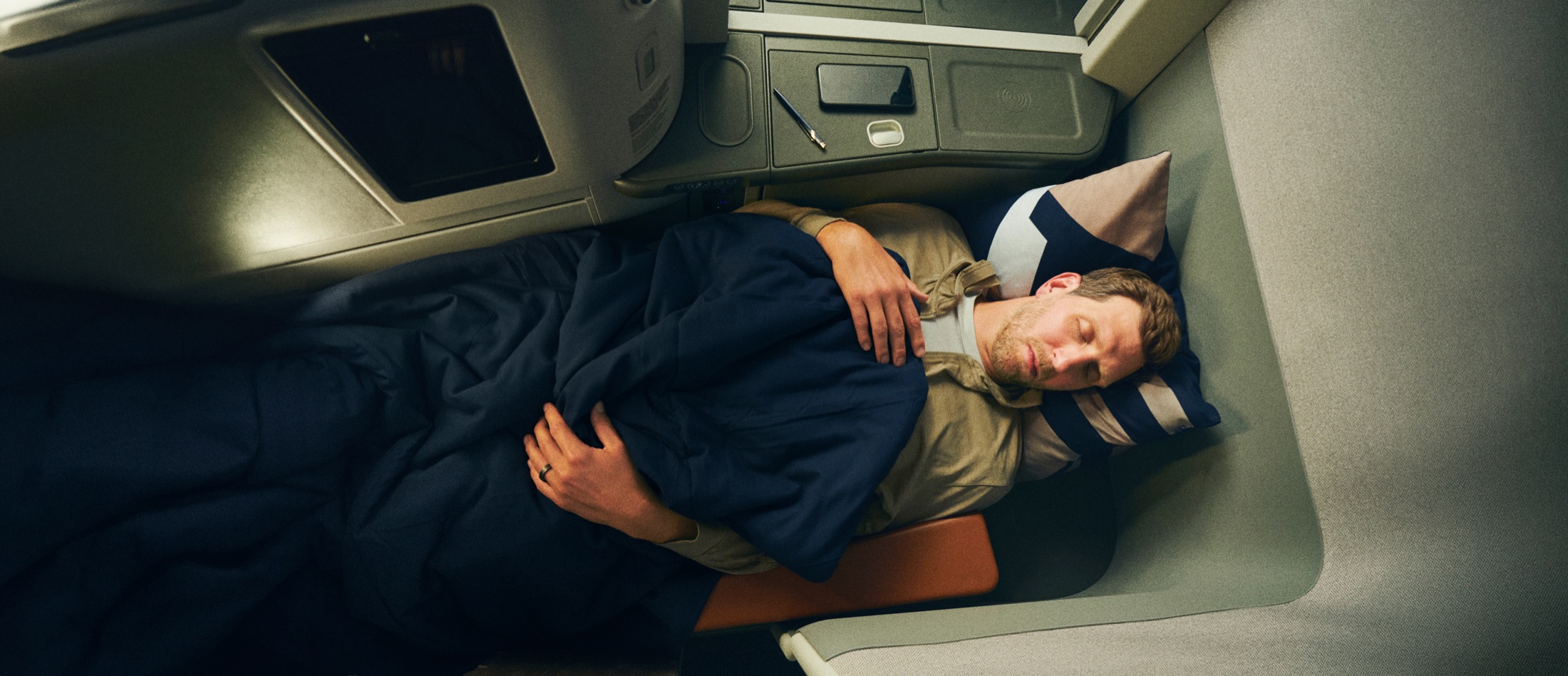 Dirk Nowitzki stretched out across the Lufthansa Allegris extra-long bed, with his face on the right side of the frame
